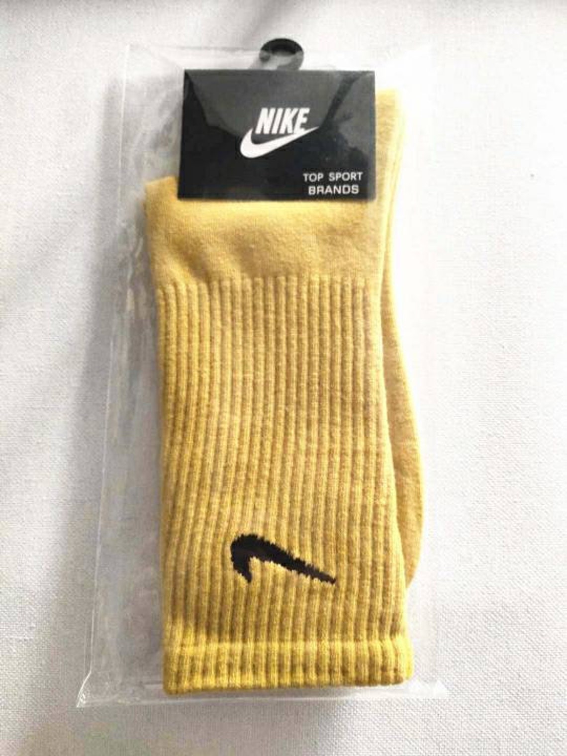 yellow nike sock boots