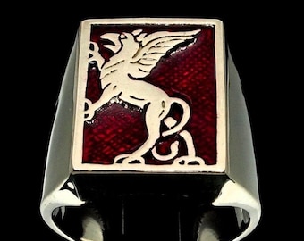 Anillo de grifo de plata de ley: águila alada con esmalte rojo, símbolo del antiguo Egipto.