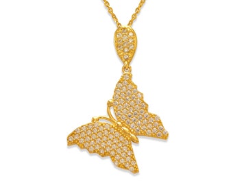 May include: A gold chain necklace with a butterfly pendant. The butterfly is covered in small, clear stones.