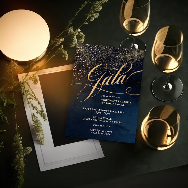 May include: A navy blue invitation with gold glitter accents and the word "Gala" in gold script. The invitation is for a Winchester Charity Fundraising Gala on August 15th, 2023, from 7pm to 11pm at the Shore Hotel. The address and RSVP information are included.