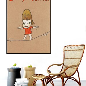 May include: A framed illustration of a cartoon girl in a red dress walking on a tightrope. The text "Live for Moment" is written in red at the top of the image.