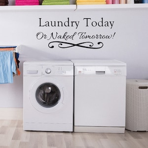 May include: White laundry room with two white appliances, a washing machine and a dishwasher. There is a white wicker laundry basket and a sign on the wall that reads "Laundry Today Or Naked Tomorrow!"