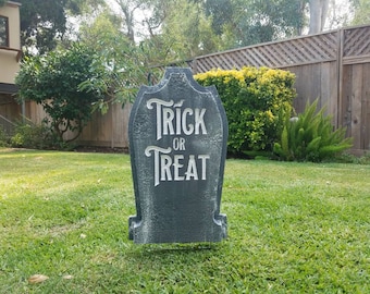 Halloween custom gravestone tombstone Trick or Treat. LED Illuminated with 20 color choices. Remote included. Use as a Halloween Sign.