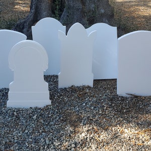 6 Halloween Haunted Mansion shaped raw foam tombstones. Make your own DIY graveyard.  Carve your favorite sayings and paint how you want.