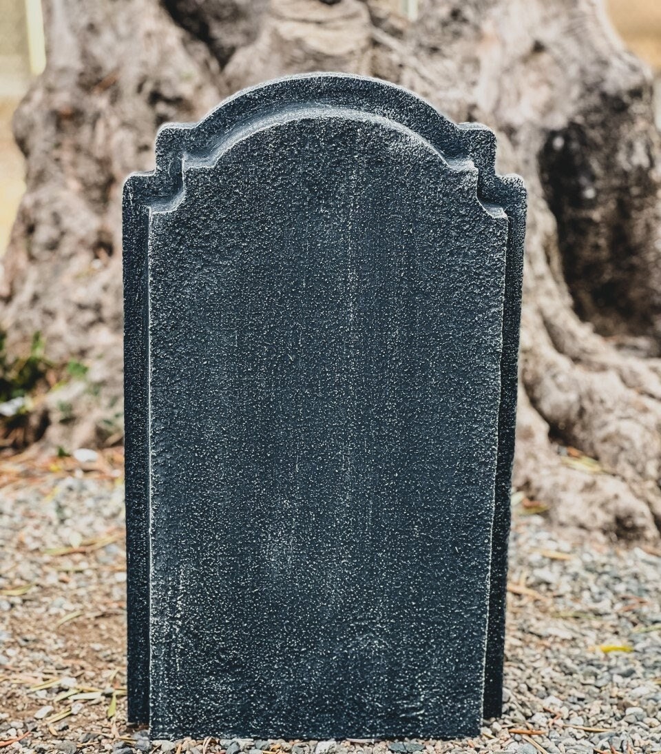 Blank Tombstone At Night