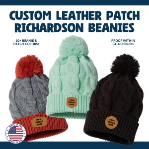 May include: Three cable-knit beanies with leather patches that read "YOUR DESIGN HERE." The beanies are gray with a red pom, mint green with a mint pom, and black with a black pom. Text at the top says "CUSTOM LEATHER PATCH RICHARDSON BEANIES."