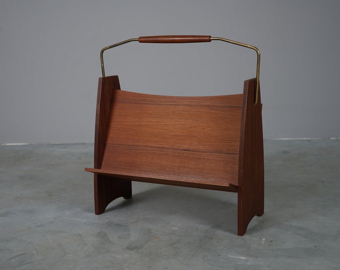 Minimalist magazine rack from the 60s with teak and metal