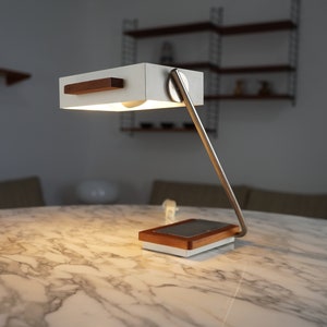 From the 60s model 45110 Kaiser Leuchte Idell table lamp, teak TOP design