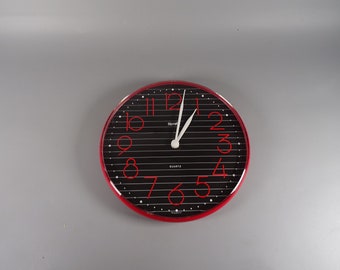 Wild 1980s wall clock in red and black / Red and Black Clock from the 1970s