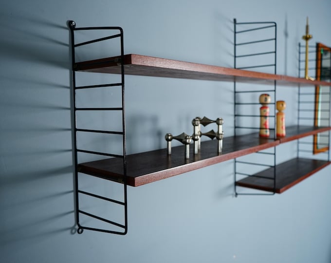 Teak shelving system by Nisse Strinning & Kajsa Strinning for String / Sweden