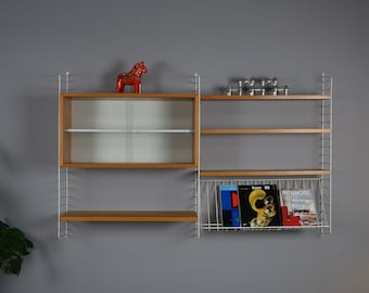 Shelving system by Nisse Strinning & Kajsa Strinning for String / Sweden