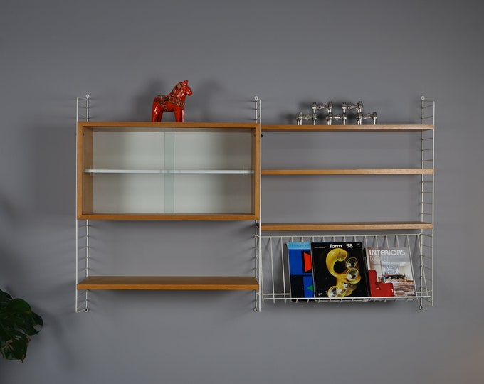 Teak shelving system by Nisse Strinning & Kajsa Strinning for String / Sweden