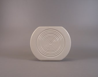 Small white ceramic vase from the 1970s with a circular pattern