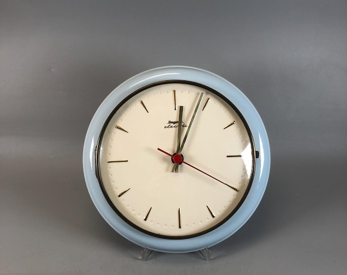 Dugema 1950s wall clock in baby blue / Clock from the 1950s