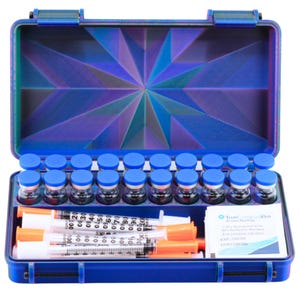 May include: A blue medical kit with a geometric design on the lid. Inside are vials with blue caps, syringes with orange caps, and a small packet with text. The kit is designed to hold medical supplies.