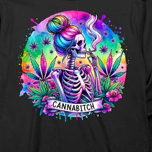 May include: Black long-sleeve shirt featuring a colorful illustration of a skeleton with a rainbow bun, smoking a cigarette. The design includes cannabis leaves and the text "CANNABITCH" on a banner.
