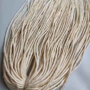 This set is Synthetic blonde crochet dreadlocks. This set can be Double ended dreads (DE) and Single ended dreads (SE) variation. This kit of dreads made by Synthetic hair - Kanekalon and ready to extensions. The material is light and absolutely safe
