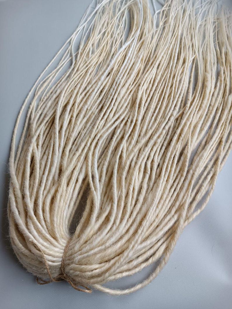 This set is Synthetic blonde crochet dreadlocks. This set can be Double ended dreads (DE) and Single ended dreads (SE) variation. This kit of dreads made by Synthetic hair - Kanekalon and ready to extensions. The material is light and absolutely safe
