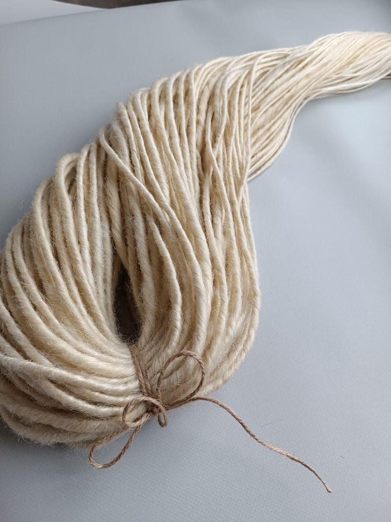 This set is Synthetic blonde crochet dreadlocks. This set can be Double ended dreads (DE) and Single ended dreads (SE) variation. This kit of dreads made by Synthetic hair - Kanekalon and ready to extensions. The material is light and absolutely safe