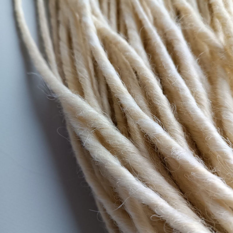 This set is Synthetic blonde crochet dreadlocks. This set can be Double ended dreads (DE) and Single ended dreads (SE) variation. This kit of dreads made by Synthetic hair - Kanekalon and ready to extensions. The material is light and absolutely safe