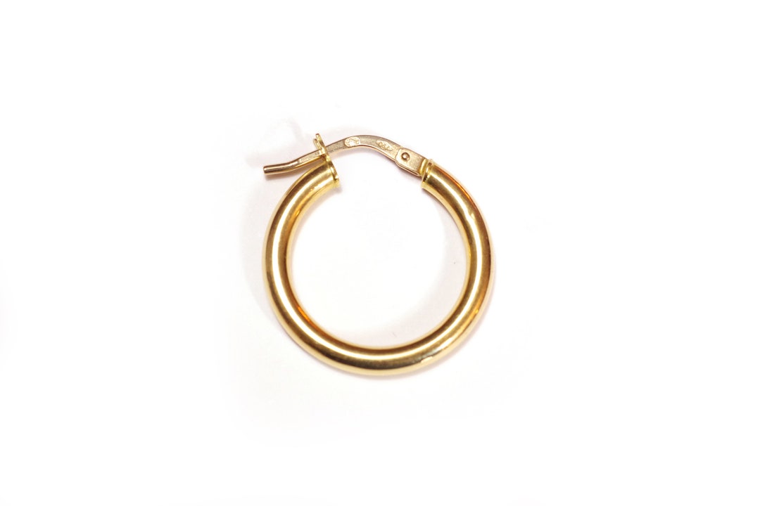 Mono orecchino in oro bianco 18k a cerchio. | GV