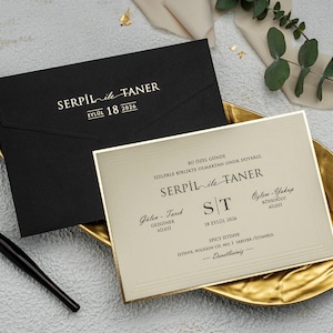 Faire-part de mariage noir et doré, enveloppes noires imprimées en typographie feuille d'or, cadre doré, carte de mariage beige en relief