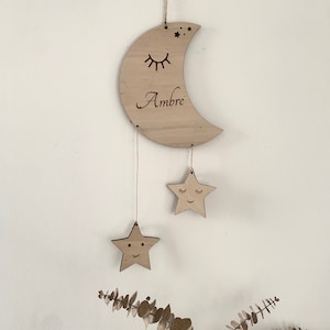 Suspension in wood moon and star