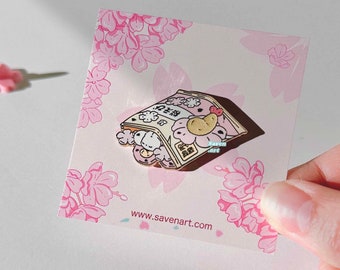May include: A pink and gold enamel pin featuring a cartoon character holding a bag of potato chips. The bag is labeled with Japanese characters and the character has a heart on its cheek. The pin is on a white card with a pink floral pattern and the website address www.savenart.com.