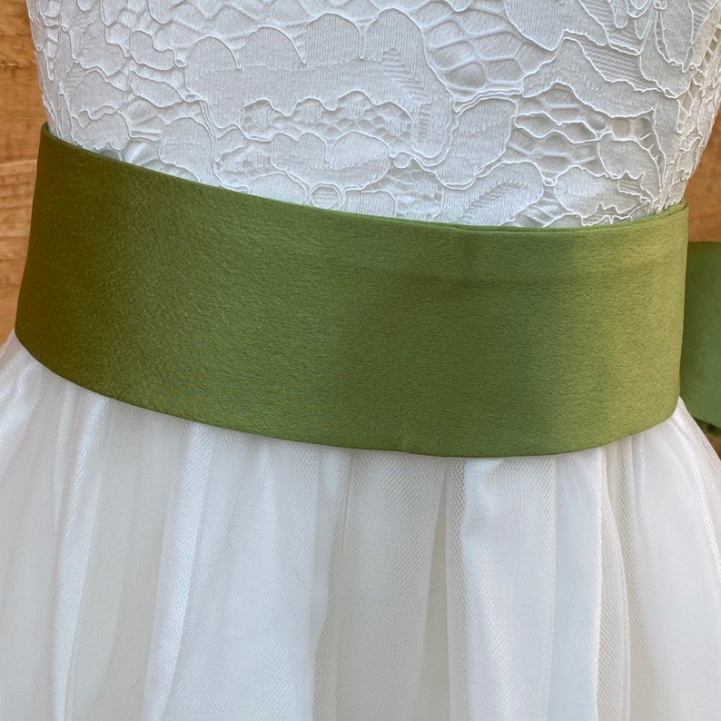 Satin Sash for Girls
Flower Girl Dress Sash
Elegant Satin Bow Belt for Girls
Girls' Formal Dress Belt
Chic and Stylish Sash
Bridesmaid or Flower Girl Waistband
Bow Sash for Little Girls
Special Occasion Sash
Ribbon Flower Girl Belt