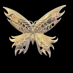 Butterfly pin