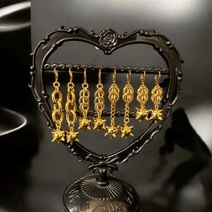 Gold flail  earrings