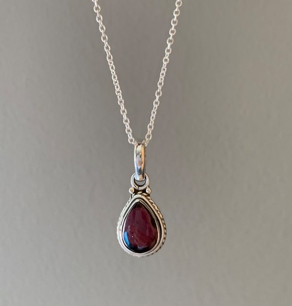 Sterling Silver Garnet and Amethyst Teardrop Shaped Pendant Sterling Silver Garnet and Amethyst Teardrop Shaped Pendant
