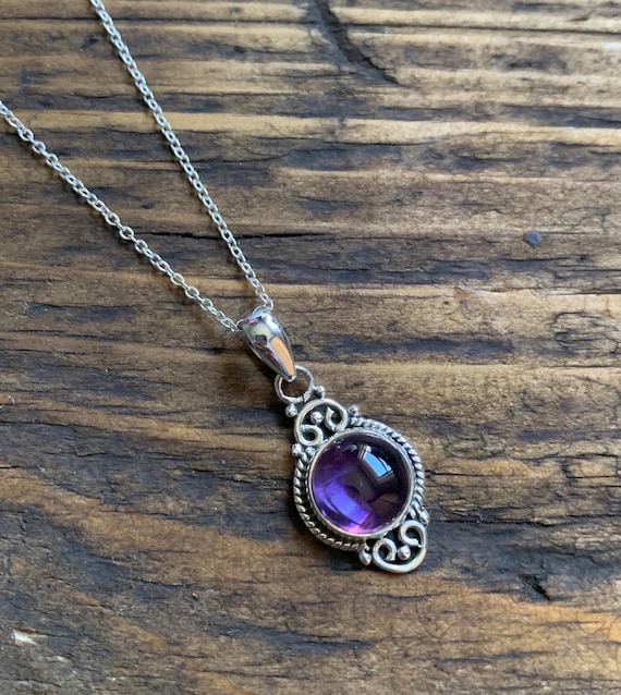 Sterling Silver Garnet and Amethyst Circle Pendant Sterling Silver Garnet and Amethyst Circle Pendant