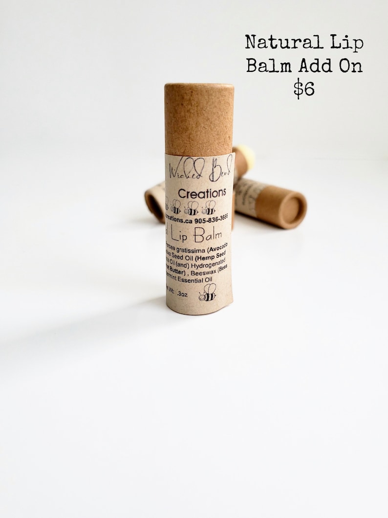 May include: A brown tube of natural lip balm with the text "Wicked Bees Creations" and "Lip Balm" on the label. The lip balm is $6 and is an add-on item.