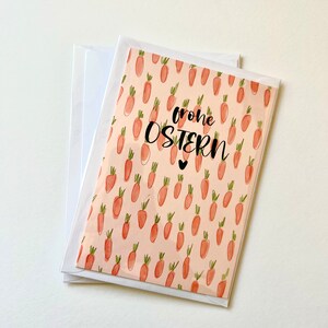 Carottes minimalistes de carte de voeux de Pâques