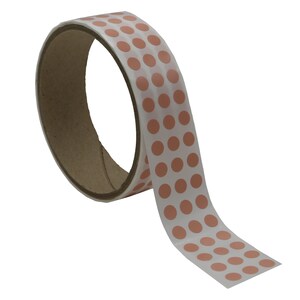 May include: A roll of adhesive-backed copper dots on a white backing. The dots are arranged in rows on the tape.