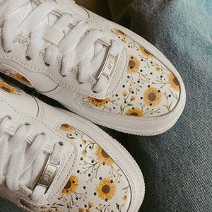 Nike sunflower slides best sale