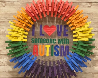 Corona con pinzas para la ropa, arcoíris, "Amo a alguien con autismo", decoración para el hogar, para la puerta principal (varios tamaños disponibles)
