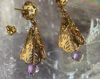 Earrings in 18 kt gold and amethyst