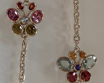 silver necklace and gemstones