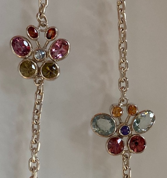 silver necklace and gemstones