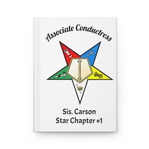 May include: A white journal with the words "Associate Conductress" above a colorful star emblem. The star has a gold center and points in red, blue, green, and yellow. Below the star is the text "Sis. Carson Star Chapter #1".