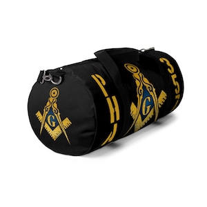 May include: Black duffel bag with a gold Masonic symbol and the letters "G" and "33" on the side.
