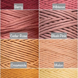 May include: A collection of six spools of cotton cord in various shades of pink, orange, and yellow. The colors are labeled "Berry", "Hibiscus", "Cedar Rose", "Blush Pink", "Creamsicle", "Melon", "Citrus", and "Buttercream".