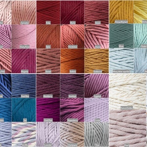 May include: A collection of 48 different colors of cotton rope, each color is displayed in a separate square. The colors range from light pink to dark green, and include shades of blue, red, purple, yellow, and brown.