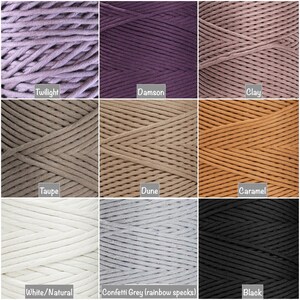 May include: Nine spools of cotton cord in various colors, including Twilight, Damson, Clay, Taupe, Dune, Caramel, White/Natural, Confetti Grey (rainbow specks), and Black.