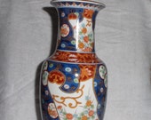 Old Imari style vase with authentication on bottom