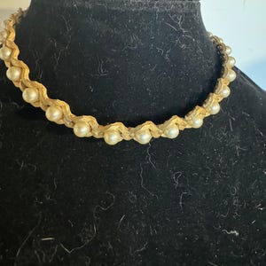 Gold toned and white beaded necklace