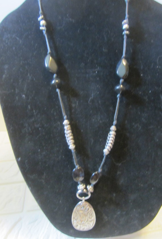 silver* toned  and black beaded pendant necklace