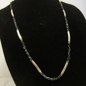 Black* and gold toned chain necklace